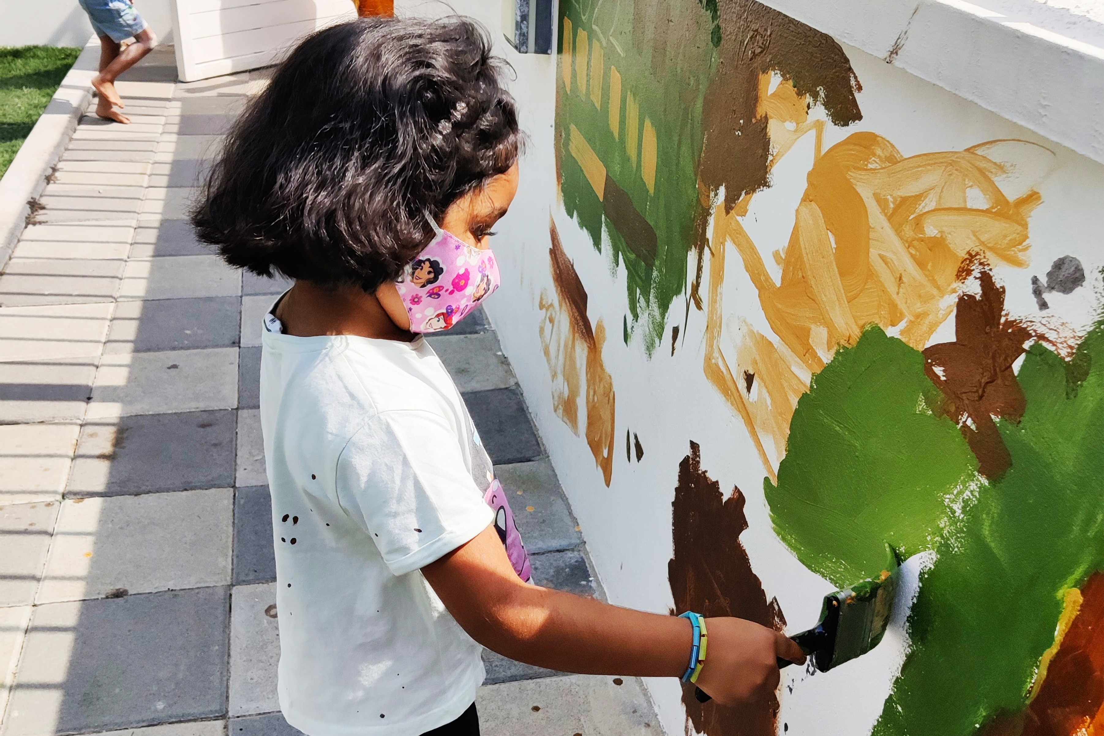 best Montessori schools in bangalore student painting image